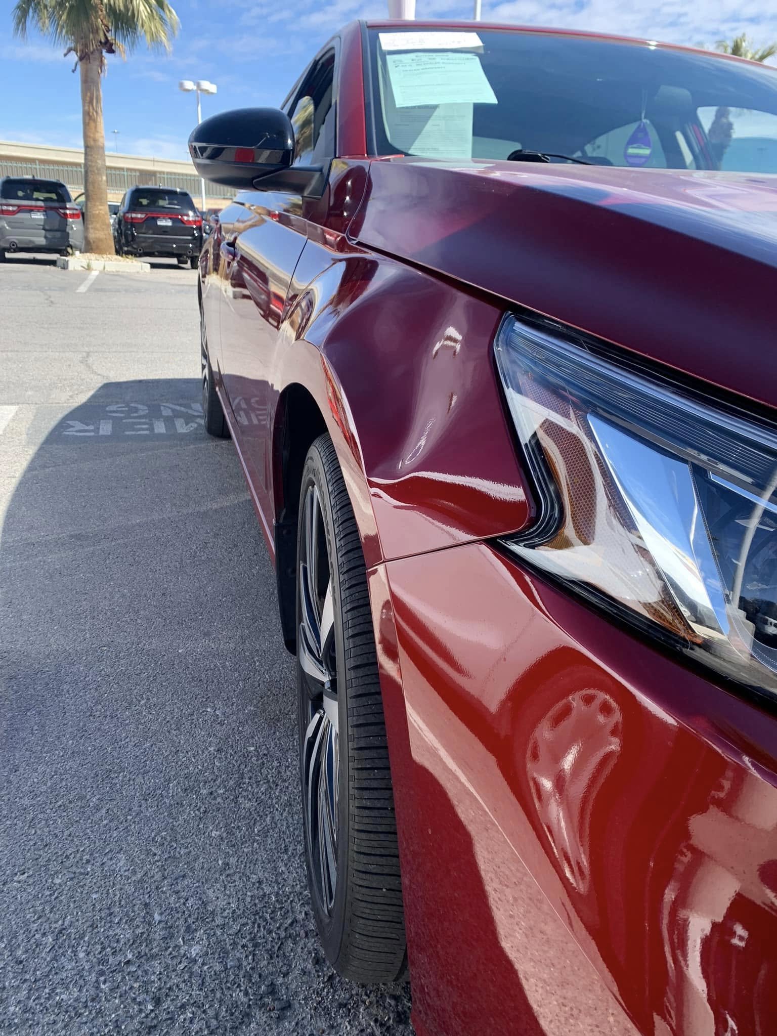 Vehicle dent before paintless repair