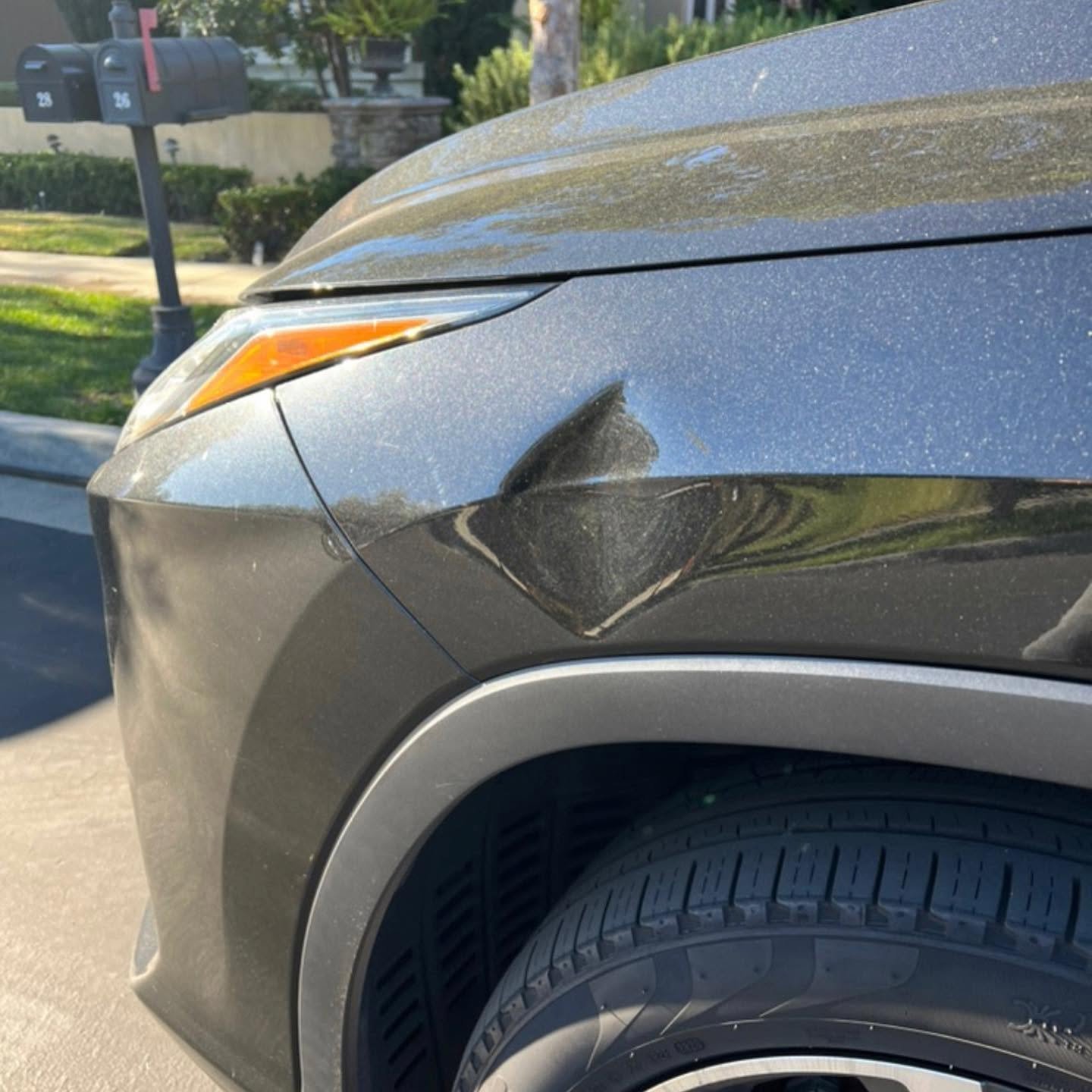 Car dent before paintless dent repair Las Vegas